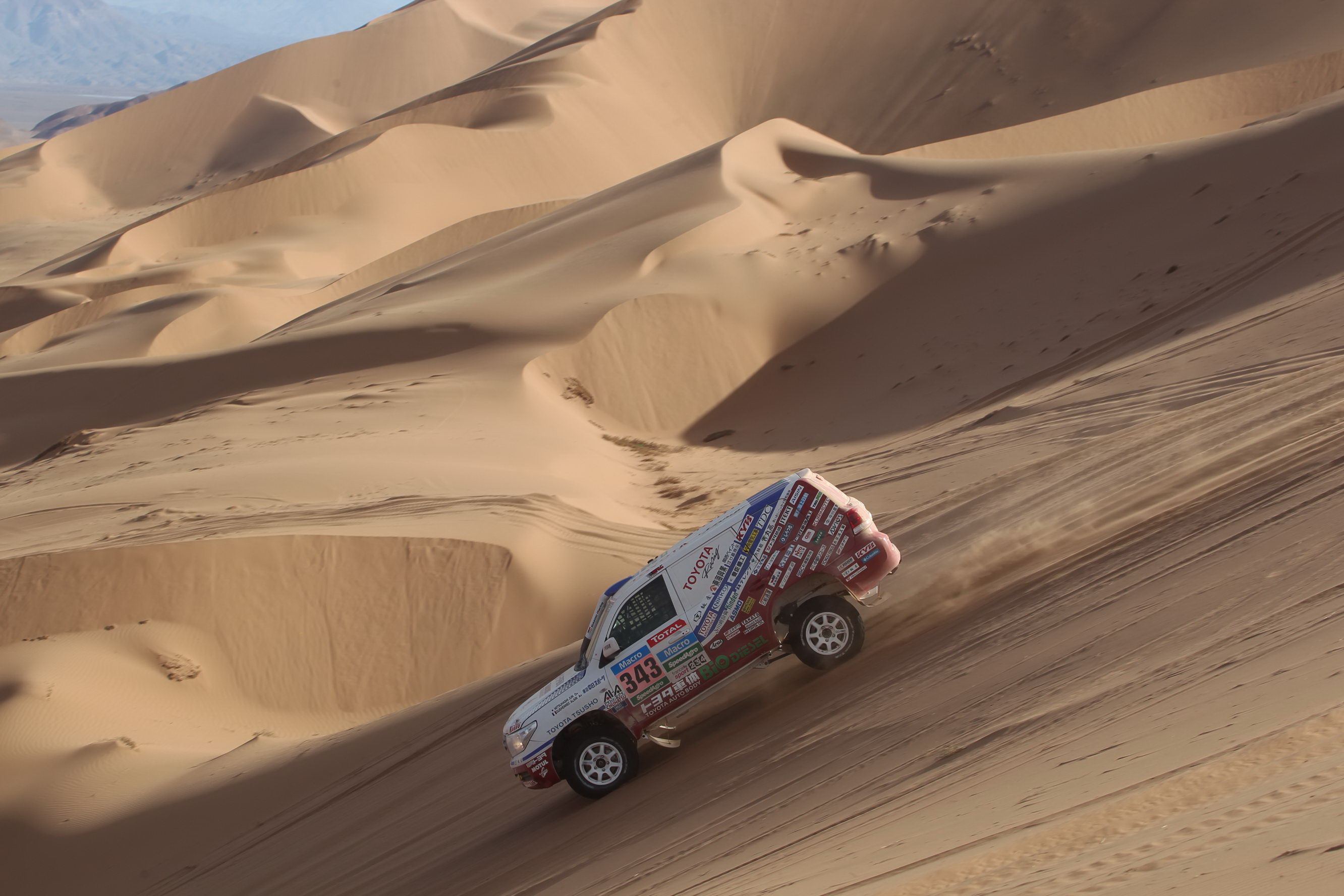They raced through Argentina to Chile, going over the Andes dunes